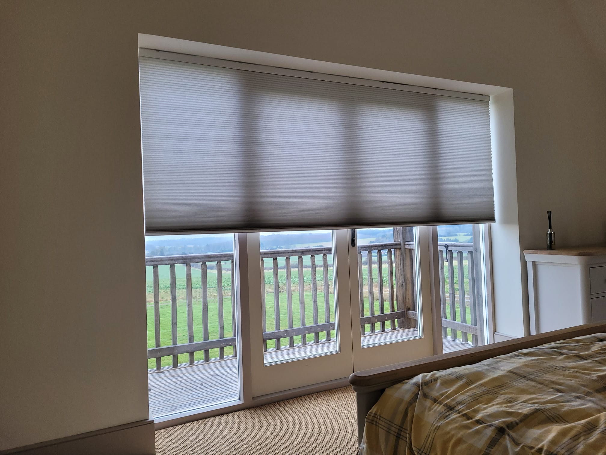 Energy saving honeycomb blinds on doors